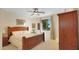 Bright bedroom with wooden furniture and large window at 6574 S Crestview Dr, Gilbert, AZ 85298