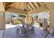 Relaxing covered picnic area with table, benches, and ceiling fan at 7575 E Indian Bend Rd # 2081, Scottsdale, AZ 85250