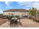 Spacious backyard with patio and landscaping at 5749 S 243Rd Dr, Buckeye, AZ 85326