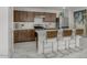 Modern kitchen with stainless steel appliances and an island at 5749 S 243Rd Dr, Buckeye, AZ 85326