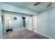 Bedroom with grey carpet, light teal walls, and a floor lamp at 710 W 18Th St, Tempe, AZ 85281