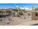 Landscaped pathway to a Southwestern style home; bridge feature at 4755 S Pura Vida Way, Gold Canyon, AZ 85118