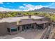 Covered patio with seating area, mountain views, and terracotta roof at 4755 S Pura Vida Way, Gold Canyon, AZ 85118