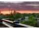 Backyard view with desert landscape and sunset at 9844 E June St, Mesa, AZ 85207