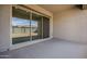 Covered patio with sliding glass doors at 274 S 164Th Dr, Goodyear, AZ 85338