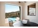 Casual breakfast nook with a stunning view of the pool and desert landscape at 23832 N 112Th Pl, Scottsdale, AZ 85255