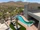 Aerial view of a home with a large pool and desert landscape at 23832 N 112Th Pl, Scottsdale, AZ 85255