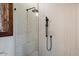 Walk-in shower with patterned tile and sleek black fixtures at 23832 N 112Th Pl, Scottsdale, AZ 85255