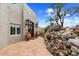 Front entry with double wood doors and brick archway at 23832 N 112Th Pl, Scottsdale, AZ 85255