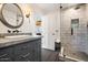 Bathroom with walk-in shower and gray vanity at 23832 N 112Th Pl, Scottsdale, AZ 85255