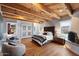 Main bedroom with wood beams, fireplace, and mountain views at 23832 N 112Th Pl, Scottsdale, AZ 85255