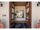 Double wood doors open to a tiled entry with a view at 23832 N 112Th Pl, Scottsdale, AZ 85255