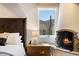 Bedroom with fireplace and mountain views at 23832 N 112Th Pl, Scottsdale, AZ 85255