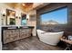 Spa-like bathroom with soaking tub and double vanity at 23832 N 112Th Pl, Scottsdale, AZ 85255