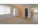 Bright and airy entryway with tile flooring and neutral color palette at 43303 W Courtney Dr, Maricopa, AZ 85138