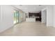 Spacious living room with an open floor plan and access to the back patio at 17975 W Vogel Ave, Goodyear, AZ 85338