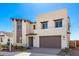 Contemporary two-story home with clean lines and a neutral color scheme at 17975 W Vogel Ave, Goodyear, AZ 85338