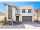 Two-story modern home with attached garage at 17975 W Vogel Ave, Goodyear, AZ 85338