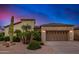 Stunning desert landscape home with a three-car garage at 26747 N 127Th Dr, Peoria, AZ 85383