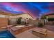 Relaxing spa with built-in seating and fire pit at 26747 N 127Th Dr, Peoria, AZ 85383