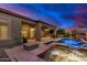 Relaxing backyard oasis with a pool, spa, and patio at 26747 N 127Th Dr, Peoria, AZ 85383