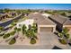 Single-story home with landscaped yard and driveway at 26747 N 127Th Dr, Peoria, AZ 85383