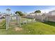 Community dog park with a fenced area and seating at 201 S Greenfield Rd # 11, Mesa, AZ 85206