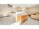Well-equipped laundry room featuring washers, dryers, and a folding counter at 201 S Greenfield Rd # 11, Mesa, AZ 85206