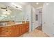 Bathroom with a double vanity and a walk-in shower at 6918 E Granada St, Mesa, AZ 85207