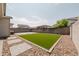 Artificial turf and paved patio backyard at 10037 E Toledo Ave, Mesa, AZ 85212