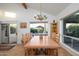 Bright dining room featuring a large wooden table and scenic views at 18720 E Via Laguna --, Rio Verde, AZ 85263