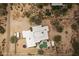 Overhead view of the house, pool, and surrounding desert landscape at 31818 N 68Th St, Cave Creek, AZ 85331