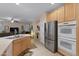 Modern kitchen with stainless steel appliances and a large island at 42818 W Morning Dove Ln, Maricopa, AZ 85138