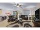Open living area with comfortable seating and access to the kitchen at 42818 W Morning Dove Ln, Maricopa, AZ 85138
