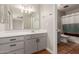 Updated bathroom with gray vanity and tiled flooring at 2970 N Oregon St # 2, Chandler, AZ 85225