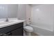 Clean bathroom with a single vanity and bathtub at 10511 E Corbin Ave, Mesa, AZ 85212