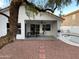 Covered patio with seating adjacent to pool at 1563 S Pennington Dr, Chandler, AZ 85286