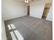Bright bedroom with carpeted floor and a ceiling fan at 12059 W Carlota Ln, Sun City, AZ 85373