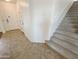 Staircase leading to upper level of the home at 12059 W Carlota Ln, Sun City, AZ 85373