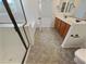 Main bathroom with double vanity, shower, and bathtub at 12059 W Carlota Ln, Sun City, AZ 85373