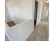 Upstairs hallway with linen closet and carpeted floor at 12059 W Carlota Ln, Sun City, AZ 85373