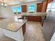 Spacious kitchen with granite countertops and stainless steel appliances at 12059 W Carlota Ln, Sun City, AZ 85373