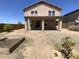 Two-story home with covered patio and spacious backyard at 12059 W Carlota Ln, Sun City, AZ 85373