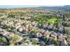 Aerial view of community, showcasing numerous houses and green spaces at 4360 E Carla Vista Dr, Gilbert, AZ 85295