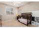 bedroom with crib, toy storage, and window coverings at 4360 E Carla Vista Dr, Gilbert, AZ 85295