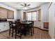 Bright kitchen nook with a table and four chairs, perfect for casual dining at 16806 W Halifax St, Surprise, AZ 85374