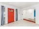 Bright entryway with red front door and tile floor at 515 W Romley Ave, Phoenix, AZ 85041