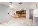 Kitchen with island and wood cabinets at 515 W Romley Ave, Phoenix, AZ 85041