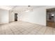 Spacious bedroom with tile floors and ceiling fan at 515 W Romley Ave, Phoenix, AZ 85041