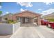 Front view of charming home with brick facade at 515 W Romley Ave, Phoenix, AZ 85041